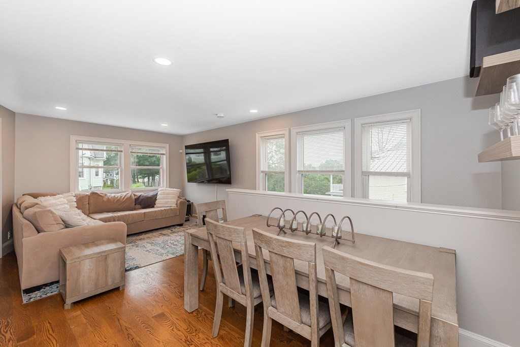 26 Foss Street, Unit 1 Medford, MA 02155 - Photo 10 of 35 a living room with furniture and a large window