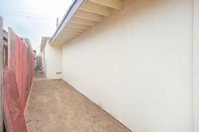 a view of a house with a yard and garage