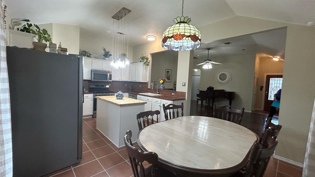116 Lightning Trail Forney, TX 75126 - Photo 13 of 19 a very nice looking dining room with a table and chairs