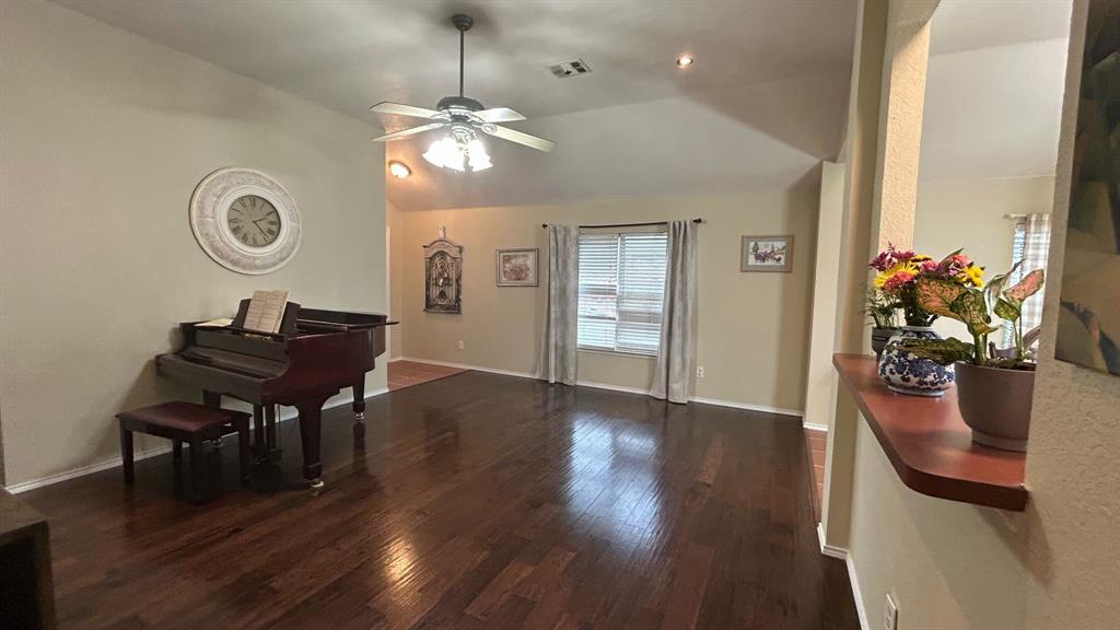 116 Lightning Trail Forney, TX 75126 - Photo 9 of 19 a view of a dining room with furniture and wooden floor