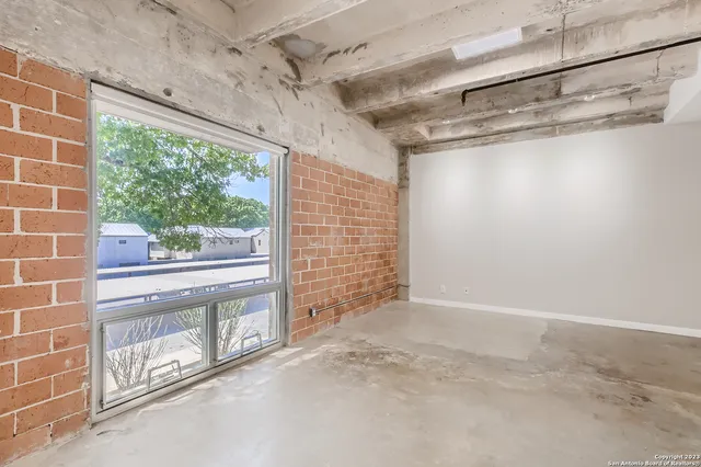 a view of a room with an empty space