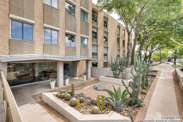 a picture of a bench in front of a door