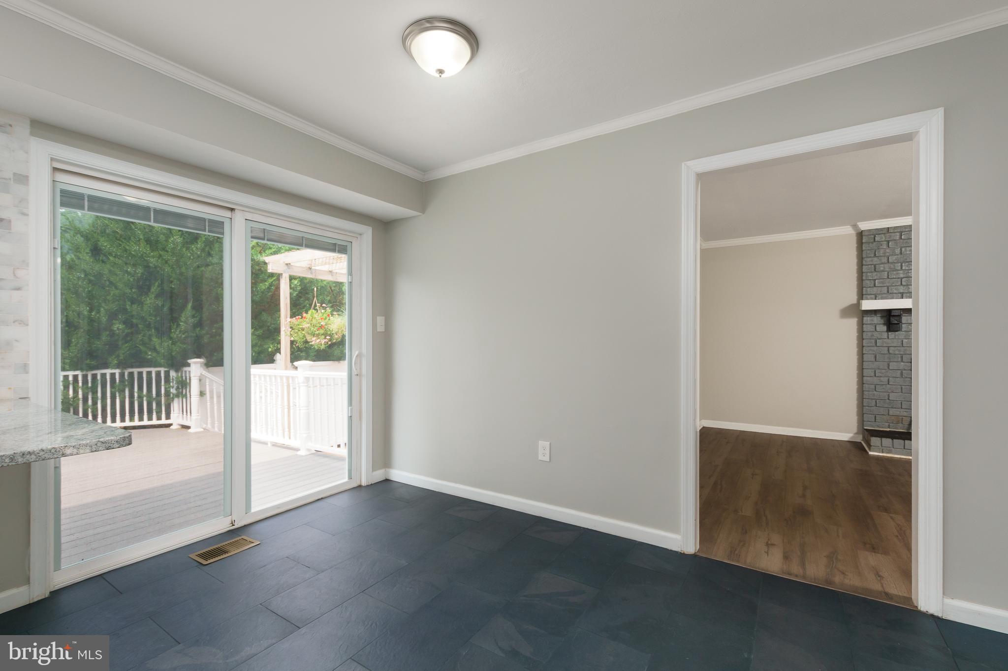 5 Sandy Lane Ewing, NJ 08628 - Photo 14 of 37 Kitchen with sliding doors to deck and rear yard