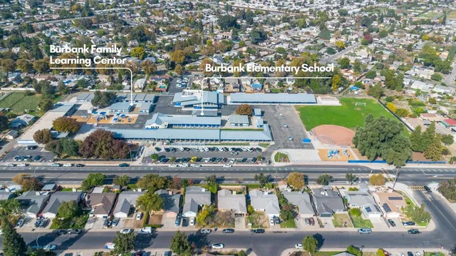an aerial view of a building with outdoor space