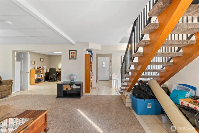 a living room with furniture and a couch