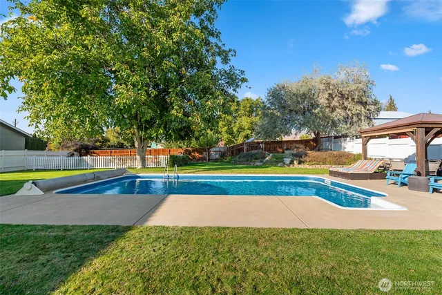 a view of outdoor space yard and swimming pool