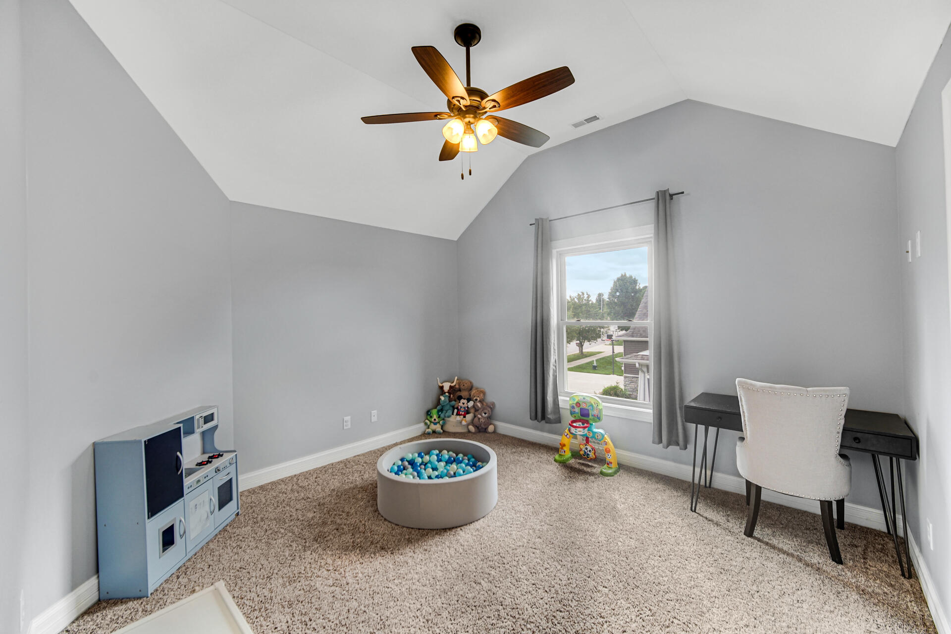 12566 Massachusetts Street Crown Point, IN 46307 - Photo 17 of 30 a living room with furniture and a window