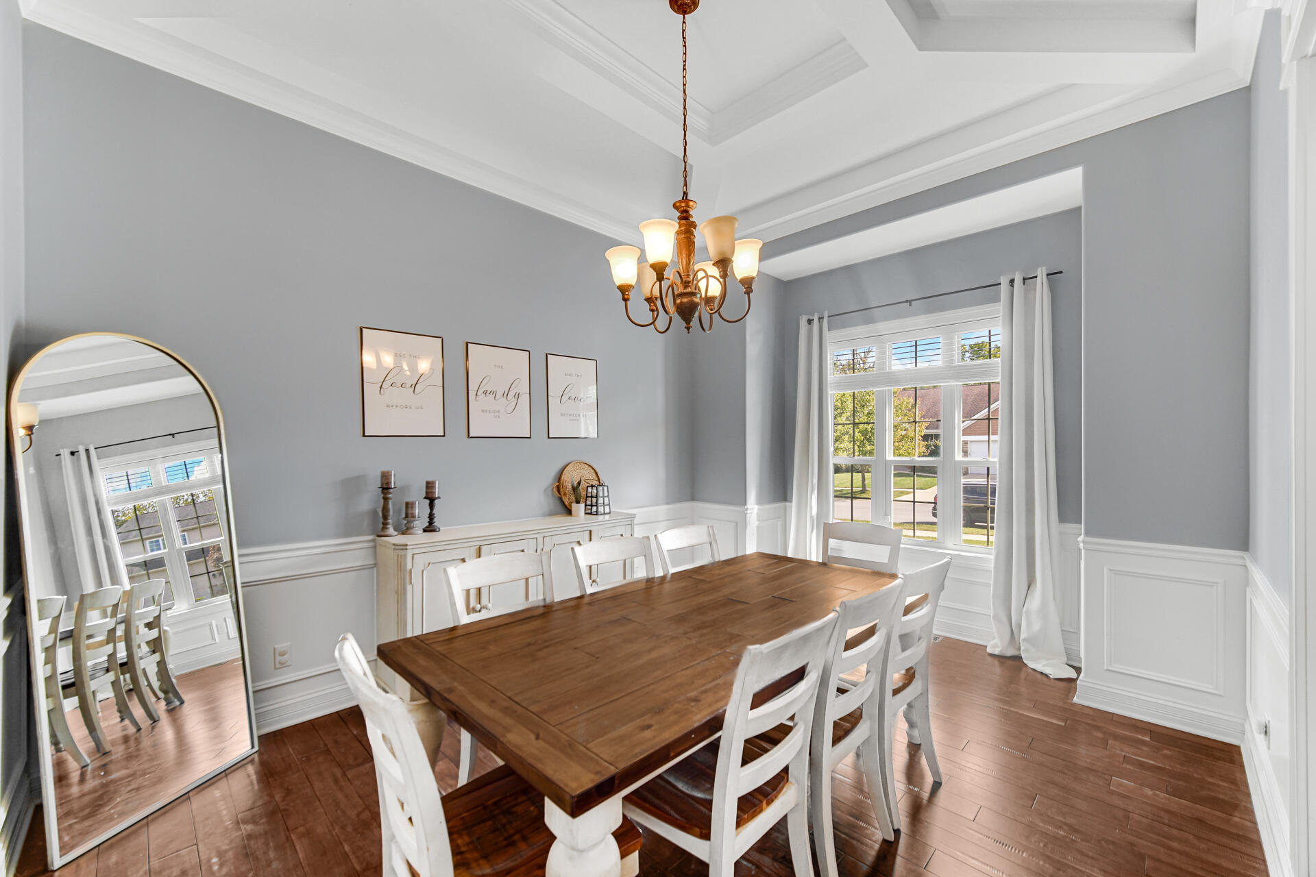 12566 Massachusetts Street Crown Point, IN 46307 - Photo 2 of 30 a view of a dining room with furniture and wooden floor