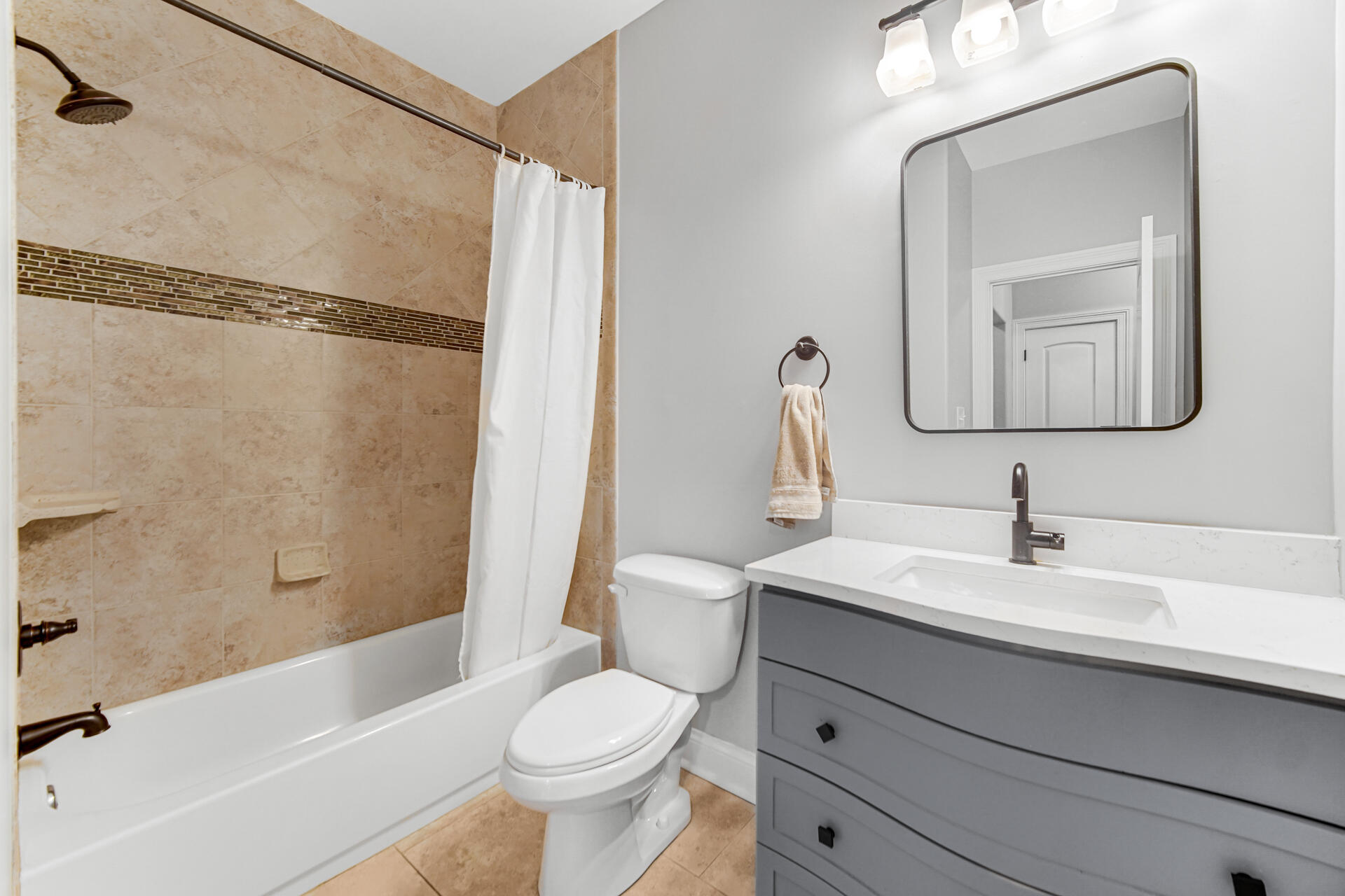 12566 Massachusetts Street Crown Point, IN 46307 - Photo 22 of 30 a bathroom with a sink toilet and shower