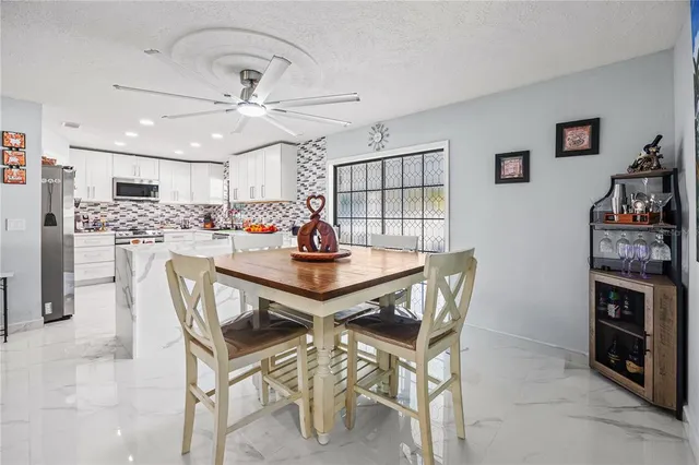 a view of a dining room with furniture