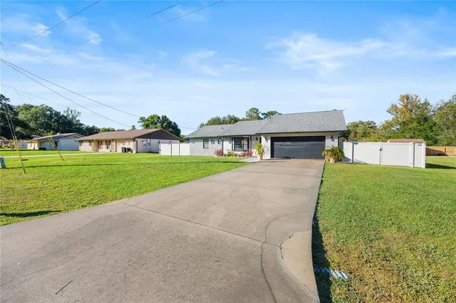 a view of house with outdoor space and porch