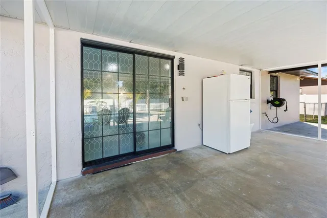 a view of a room with a large window