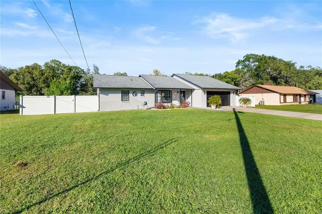 a house view with a garden space