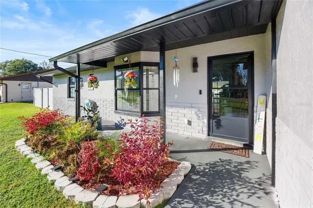 a front view of a house with a porch