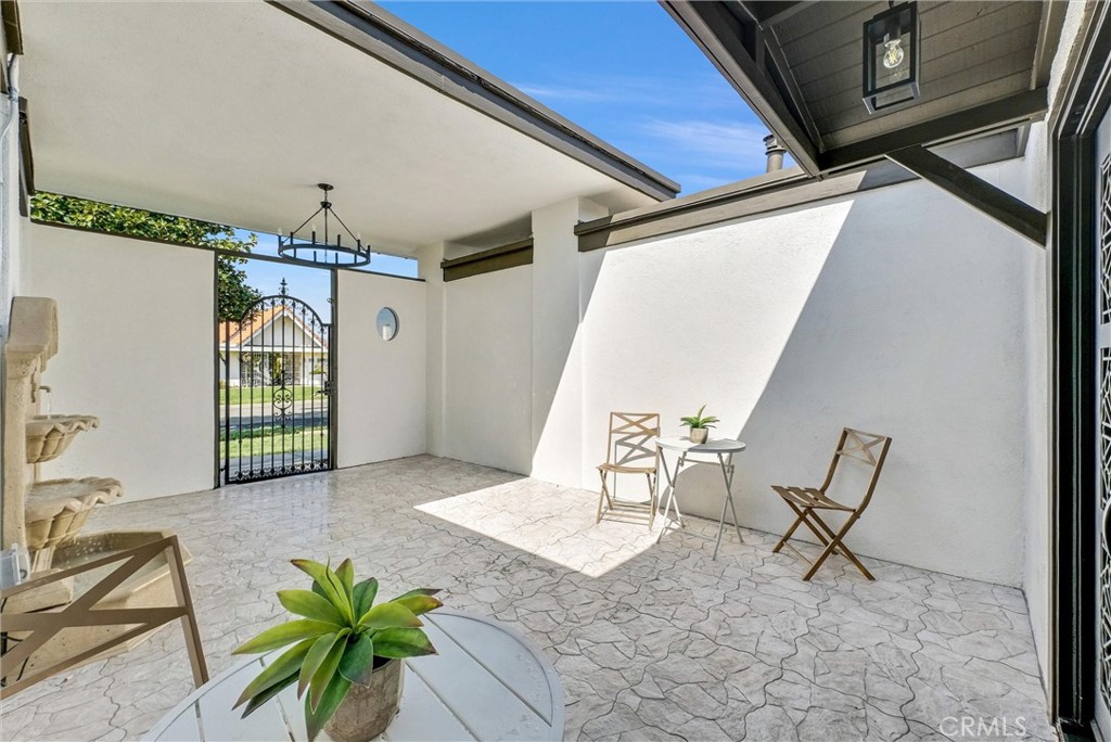 13682 Carroll Way Tustin, CA 92780 - Photo 13 of 51 a view of an entryway with wooden floor