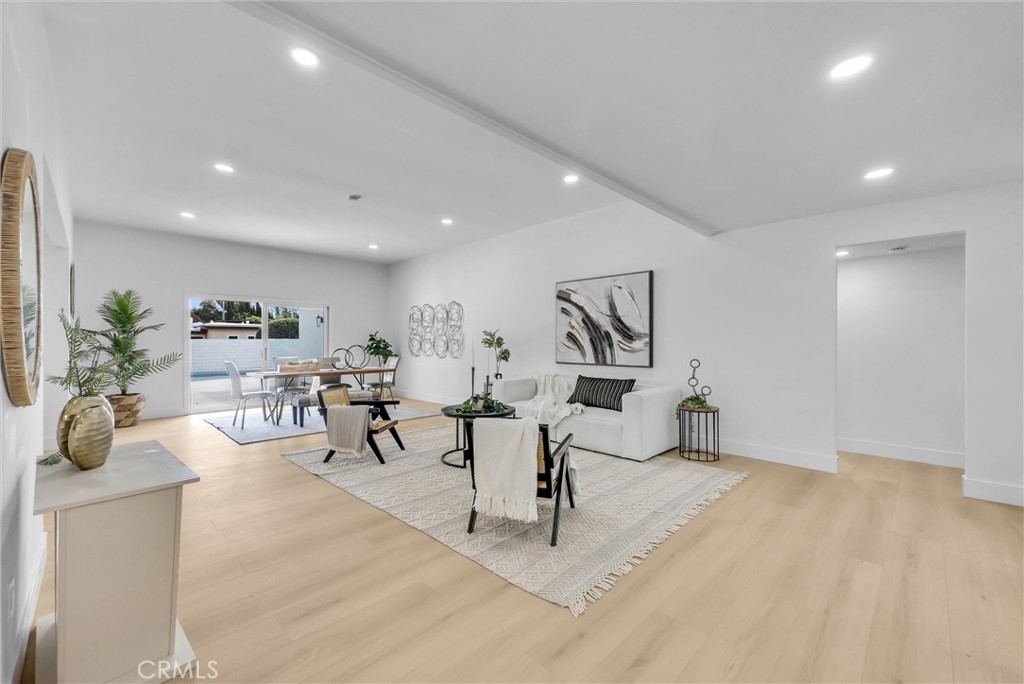 13682 Carroll Way Tustin, CA 92780 - Photo 16 of 51 a living room with furniture and wooden floor