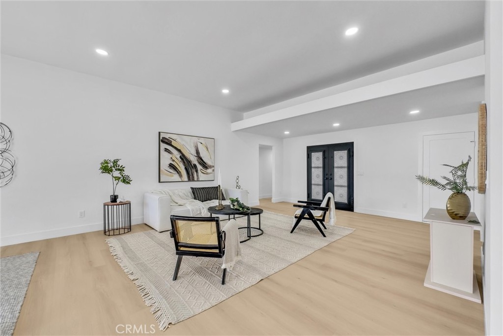 13682 Carroll Way Tustin, CA 92780 - Photo 17 of 51 a living room with furniture and wooden floor