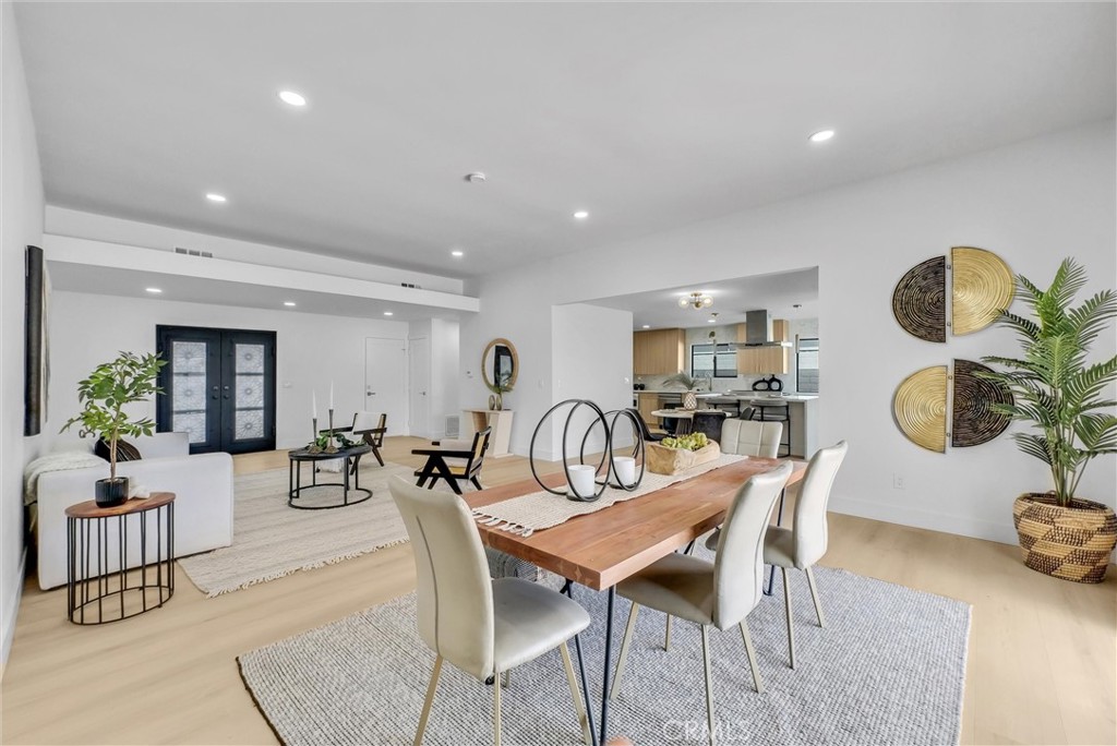 13682 Carroll Way Tustin, CA 92780 - Photo 2 of 51 a dining room with furniture and wooden floor