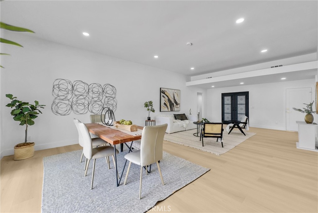13682 Carroll Way Tustin, CA 92780 - Photo 21 of 51 a living room with furniture and potted plant