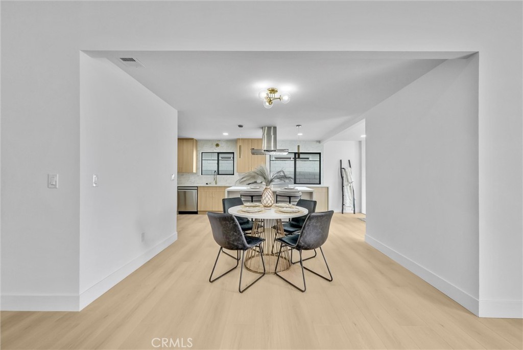 13682 Carroll Way Tustin, CA 92780 - Photo 22 of 51 a dining room with furniture and window