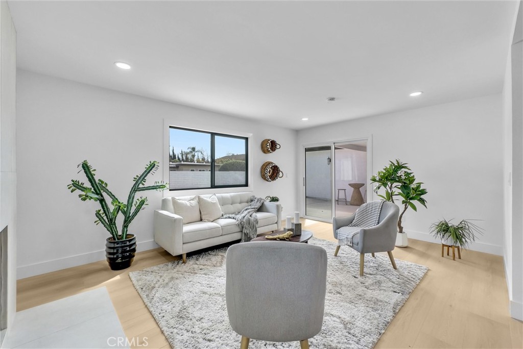 13682 Carroll Way Tustin, CA 92780 - Photo 23 of 51 a living room with furniture and a potted plant