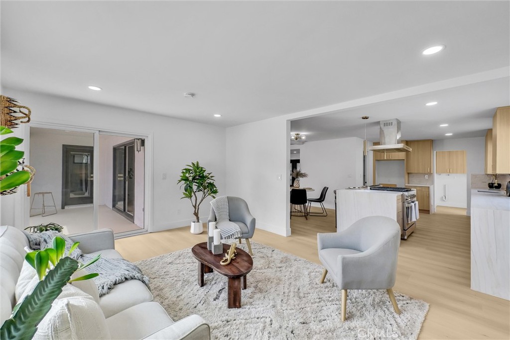 13682 Carroll Way Tustin, CA 92780 - Photo 24 of 51 a living room with furniture and a dining room