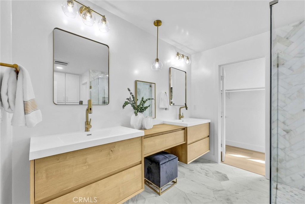13682 Carroll Way Tustin, CA 92780 - Photo 41 of 51 a bathroom with a sink and a mirror