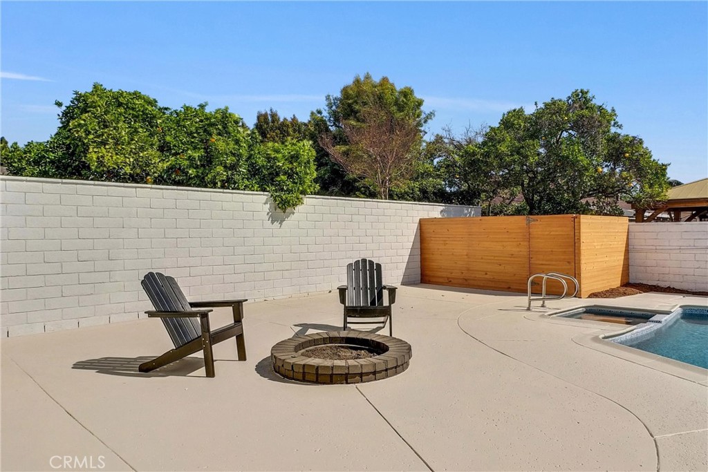 13682 Carroll Way Tustin, CA 92780 - Photo 47 of 51 a backyard of a house with table and chairs