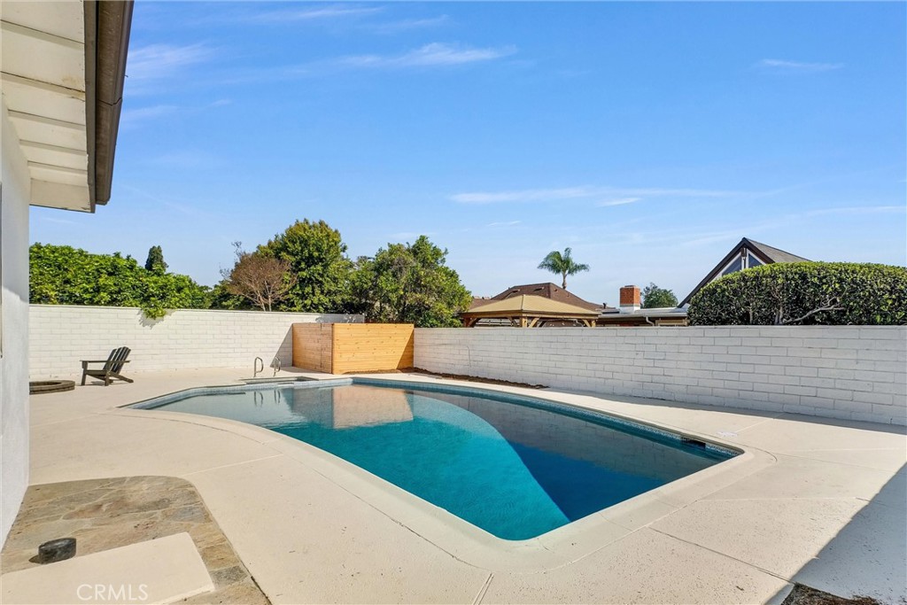 13682 Carroll Way Tustin, CA 92780 - Photo 50 of 51 a view of a swimming pool with a patio