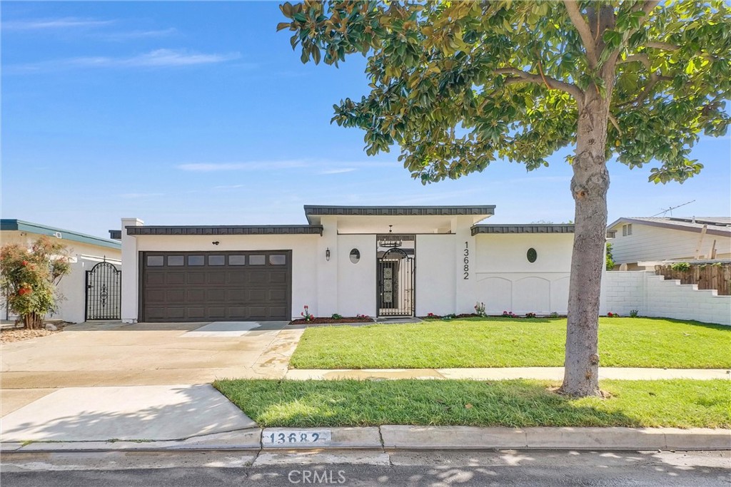 13682 Carroll Way Tustin, CA 92780 - Photo 7 of 51 a view of a house with a yard