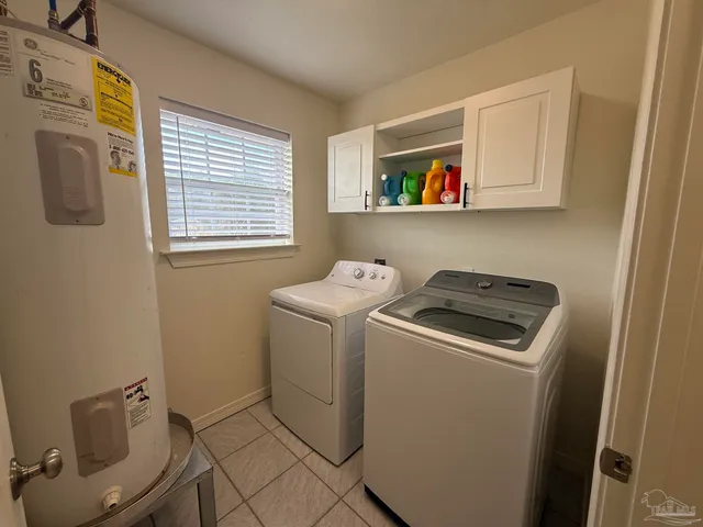 a bathroom with a double vanity sink and mirror