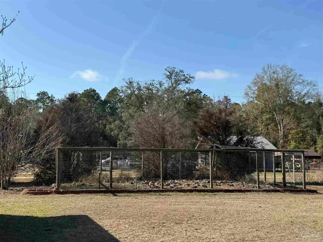 a house view with a garden space