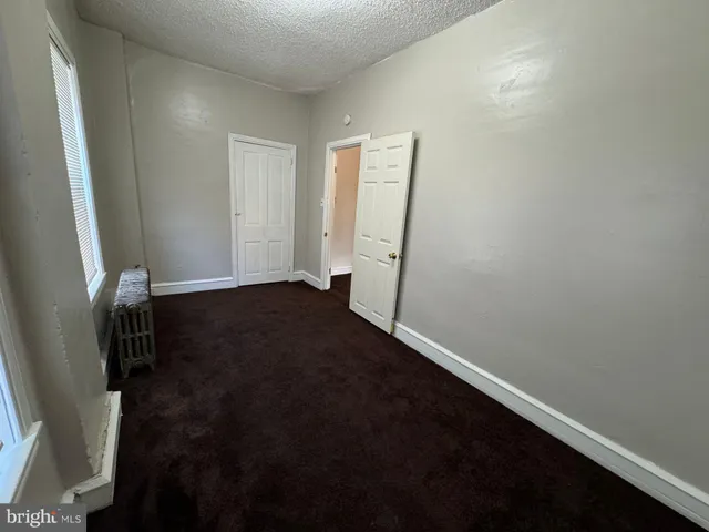 an empty room with a door