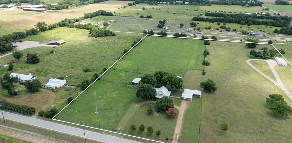 334 South Goode Road Wilmer, TX 75172 - Photo 2 of 14 Aerial overview of property's location featuring rural landscape and property boundaries highlighted