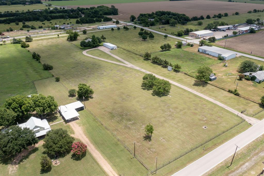334 South Goode Road Wilmer, TX 75172 - Photo 5 of 14 View of rural area featuring a pastoral area