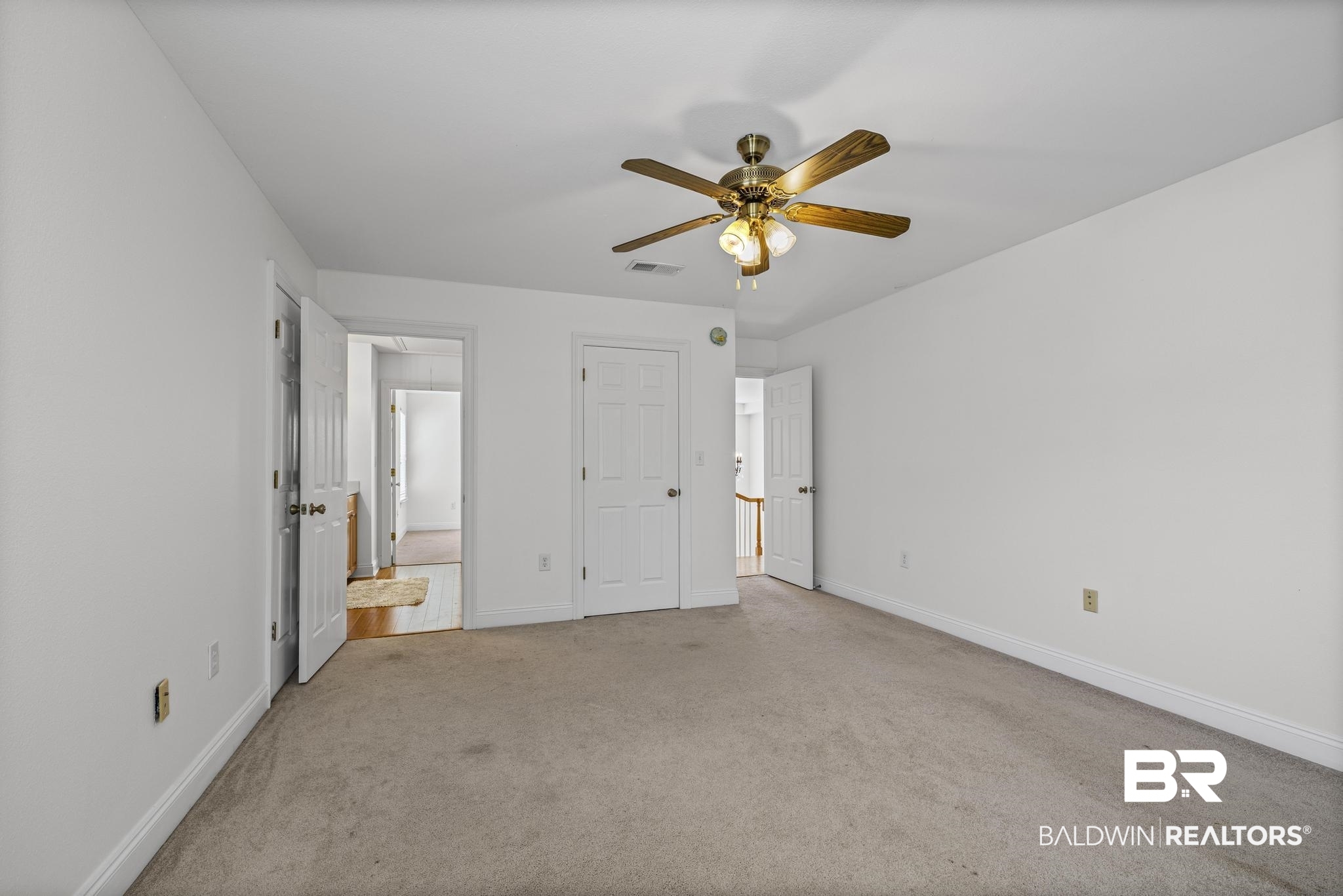 32875 Faircloth Road Lillian, AL 36549 - Photo 43 of 85 Unfurnished bedroom featuring carpet and a ceiling fan