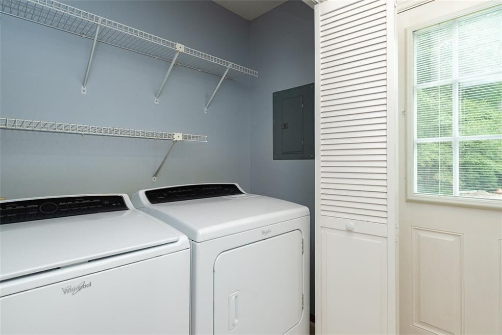 9317 Meadow Rue Place Raleigh, NC 27603 - Photo 13 of 36 a utility room with dryer and washer
