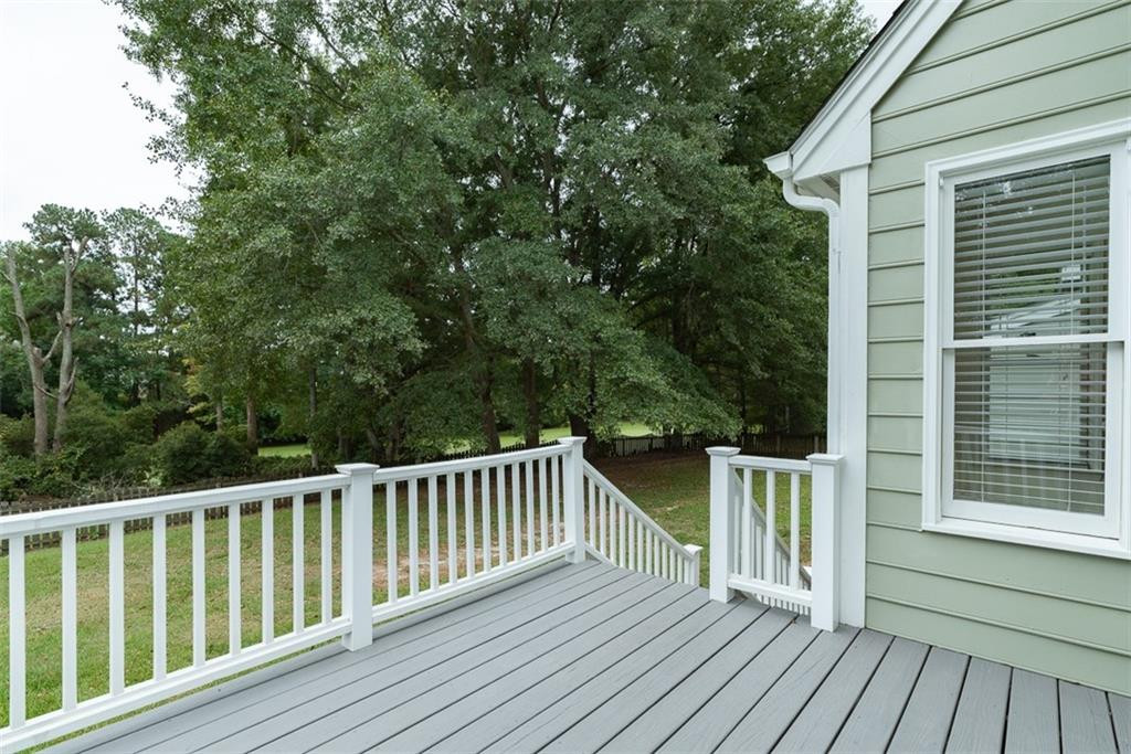 9317 Meadow Rue Place Raleigh, NC 27603 - Photo 26 of 36 a view of a wooden roof deck