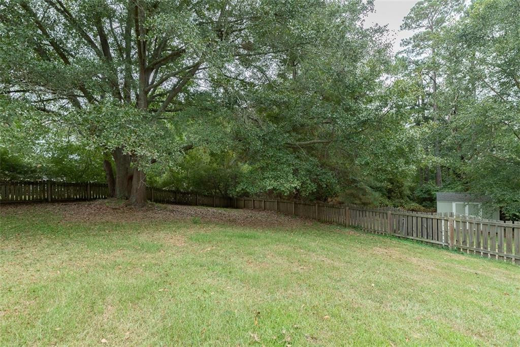 9317 Meadow Rue Place Raleigh, NC 27603 - Photo 31 of 36 a view of a backyard