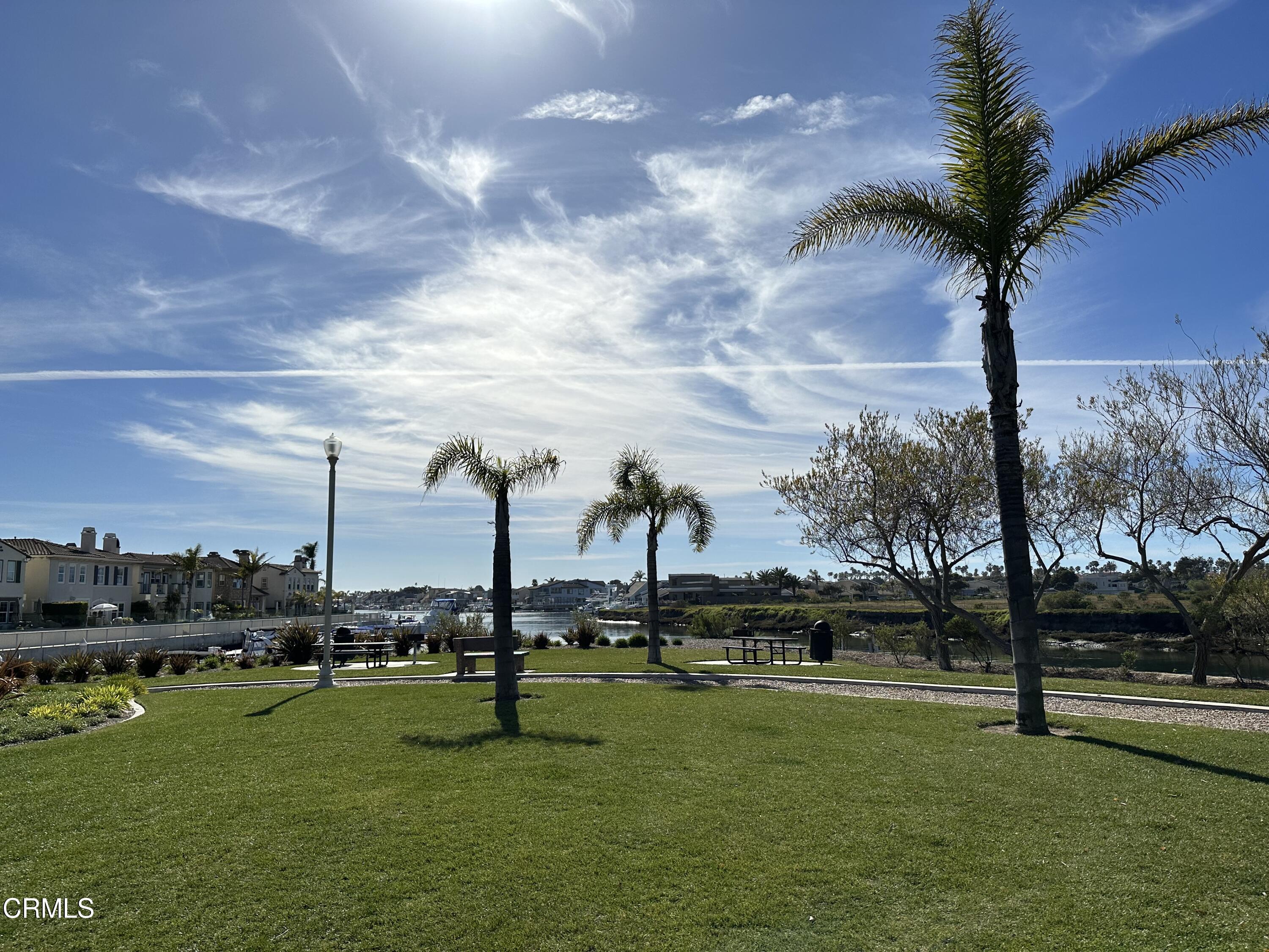 1031 Dunes Street, Unit D Oxnard, CA 93035 - Photo 17 of 26 a view of a garden with houses