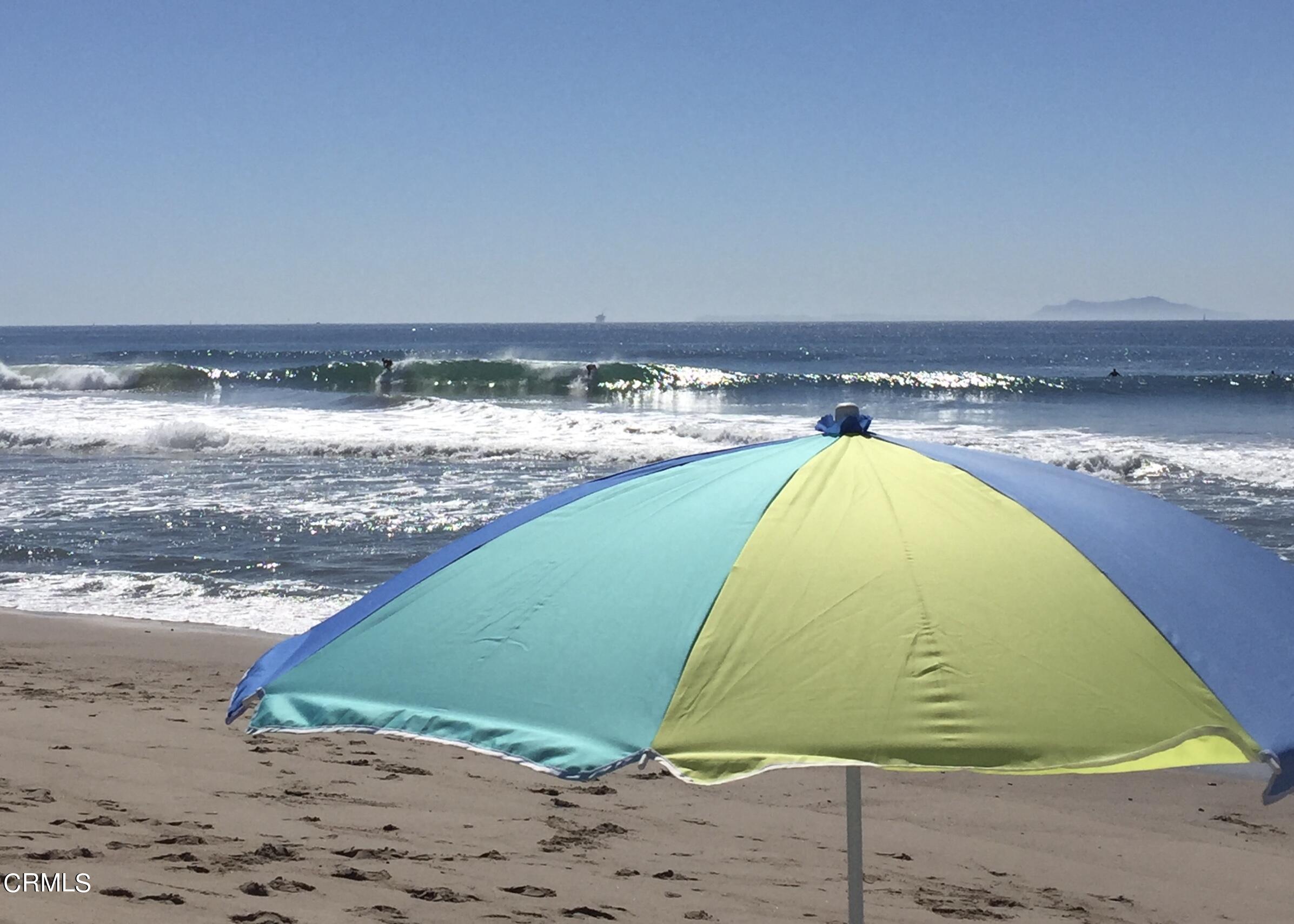 1031 Dunes Street, Unit D Oxnard, CA 93035 - Photo 26 of 26 a view of a swimming pool and a yard
