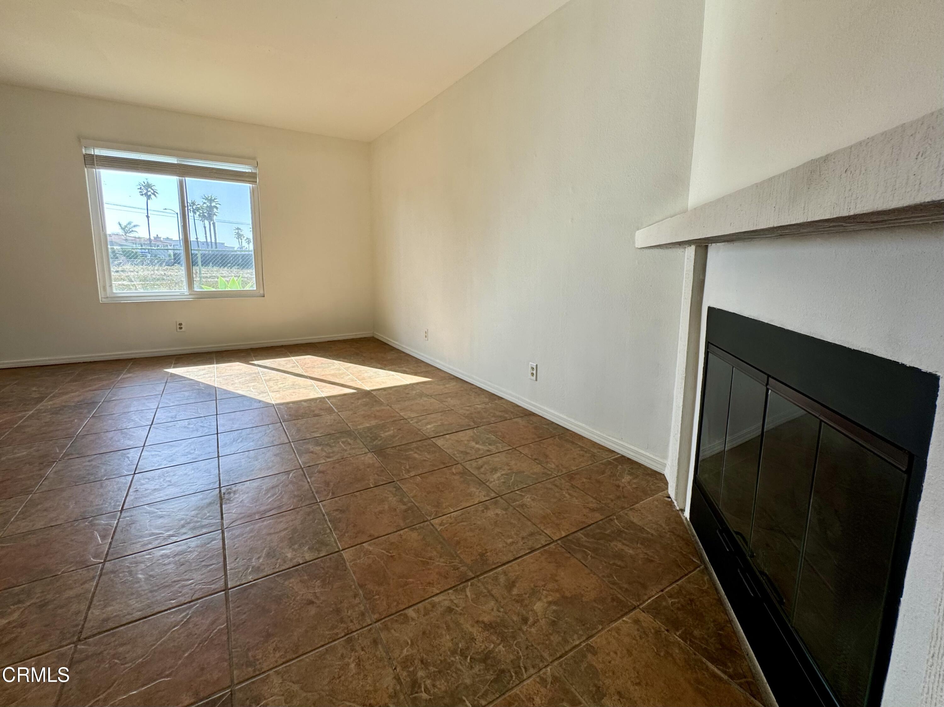 1031 Dunes Street, Unit D Oxnard, CA 93035 - Photo 4 of 26 a view of an empty room and window