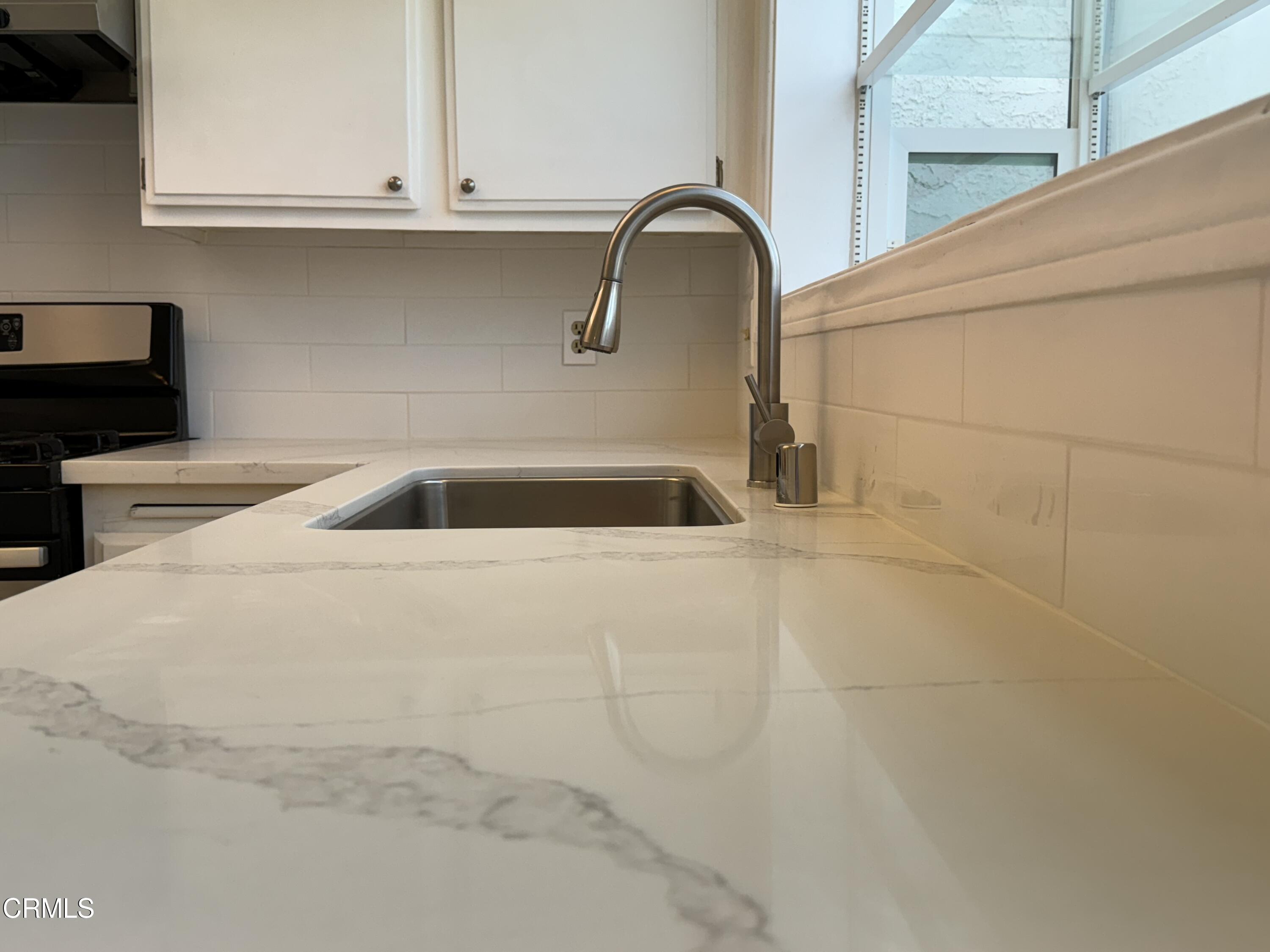 1031 Dunes Street, Unit D Oxnard, CA 93035 - Photo 7 of 26 a close view of sink and tap