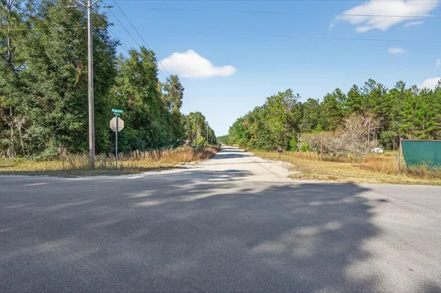 a sign broad on the side of the road