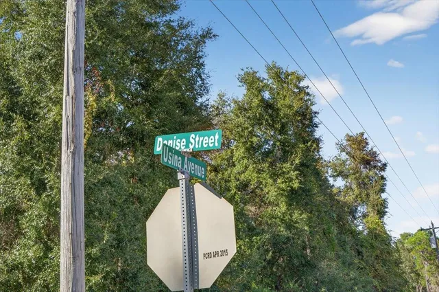 a view of a swimming pool and a yard