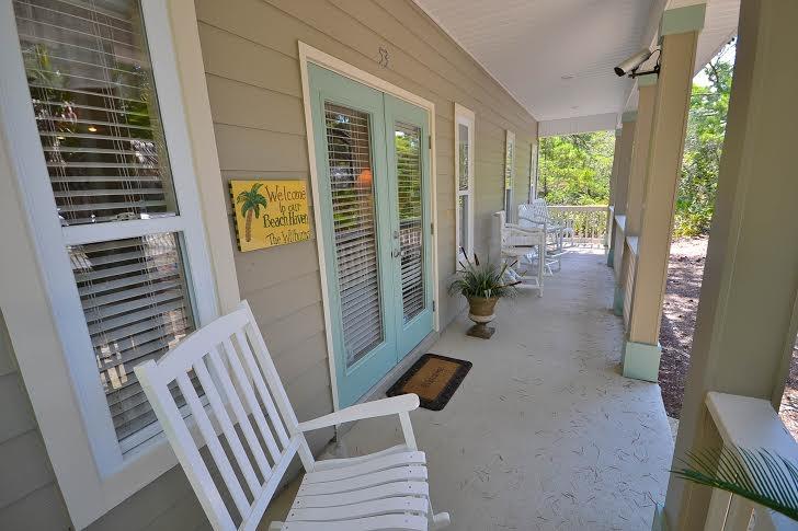 53 Maple Street Santa Rosa Beach, FL 32459 - Photo 2 of 14 a living room with furniture and a window