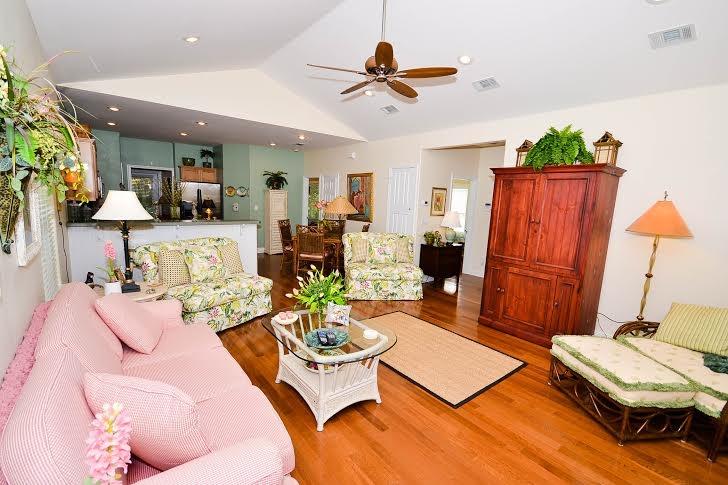 53 Maple Street Santa Rosa Beach, FL 32459 - Photo 3 of 14 a living room with furniture and a wooden floor