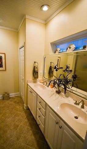 53 Maple Street Santa Rosa Beach, FL 32459 - Photo 8 of 14 a bathroom with a double vanity sink and mirror