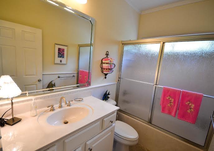 53 Maple Street Santa Rosa Beach, FL 32459 - Photo 10 of 14 a bathroom with a sink and a mirror
