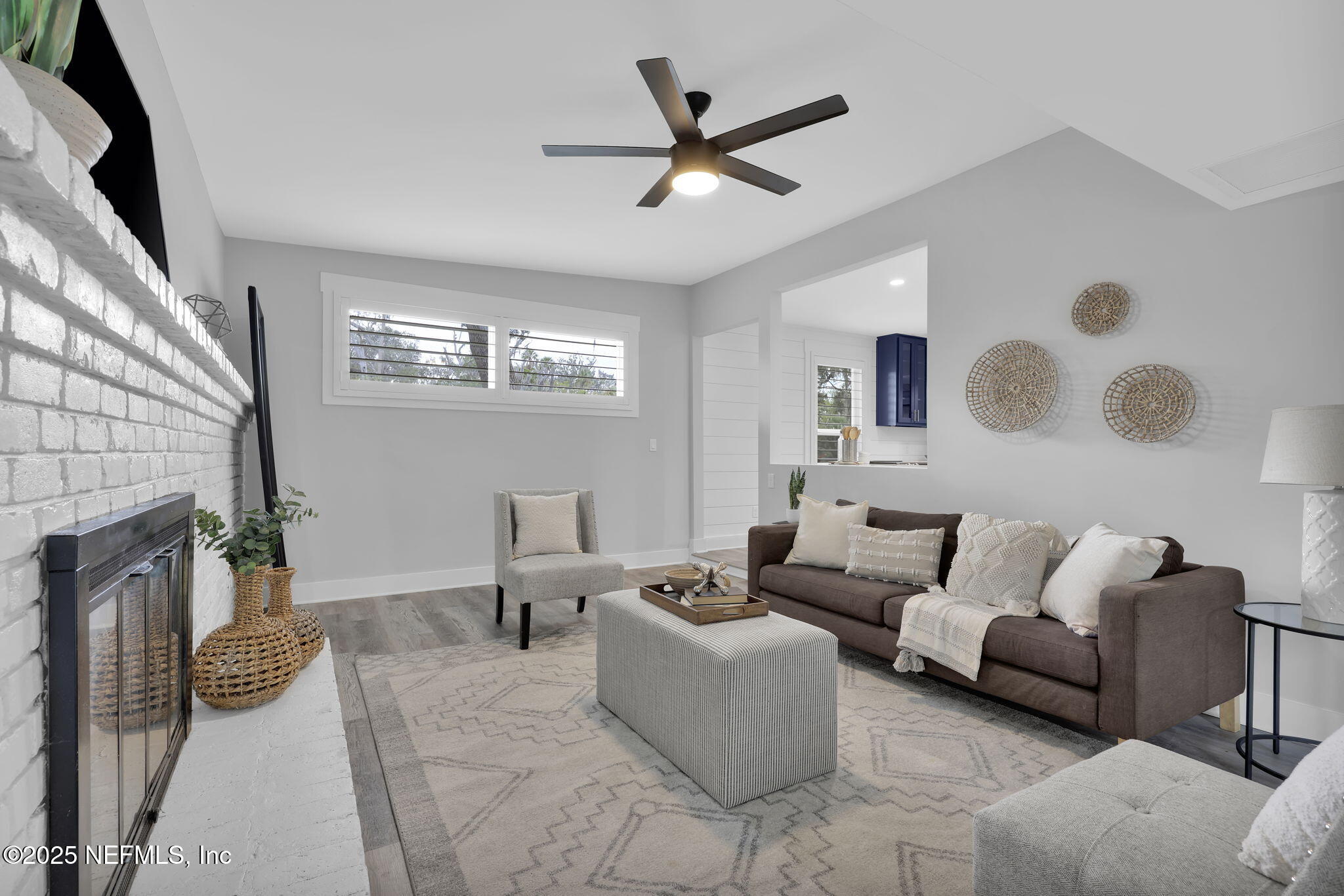 431 19th Street North Jacksonville Beach, FL 32250 - Photo 12 of 53 a living room with furniture and a fireplace